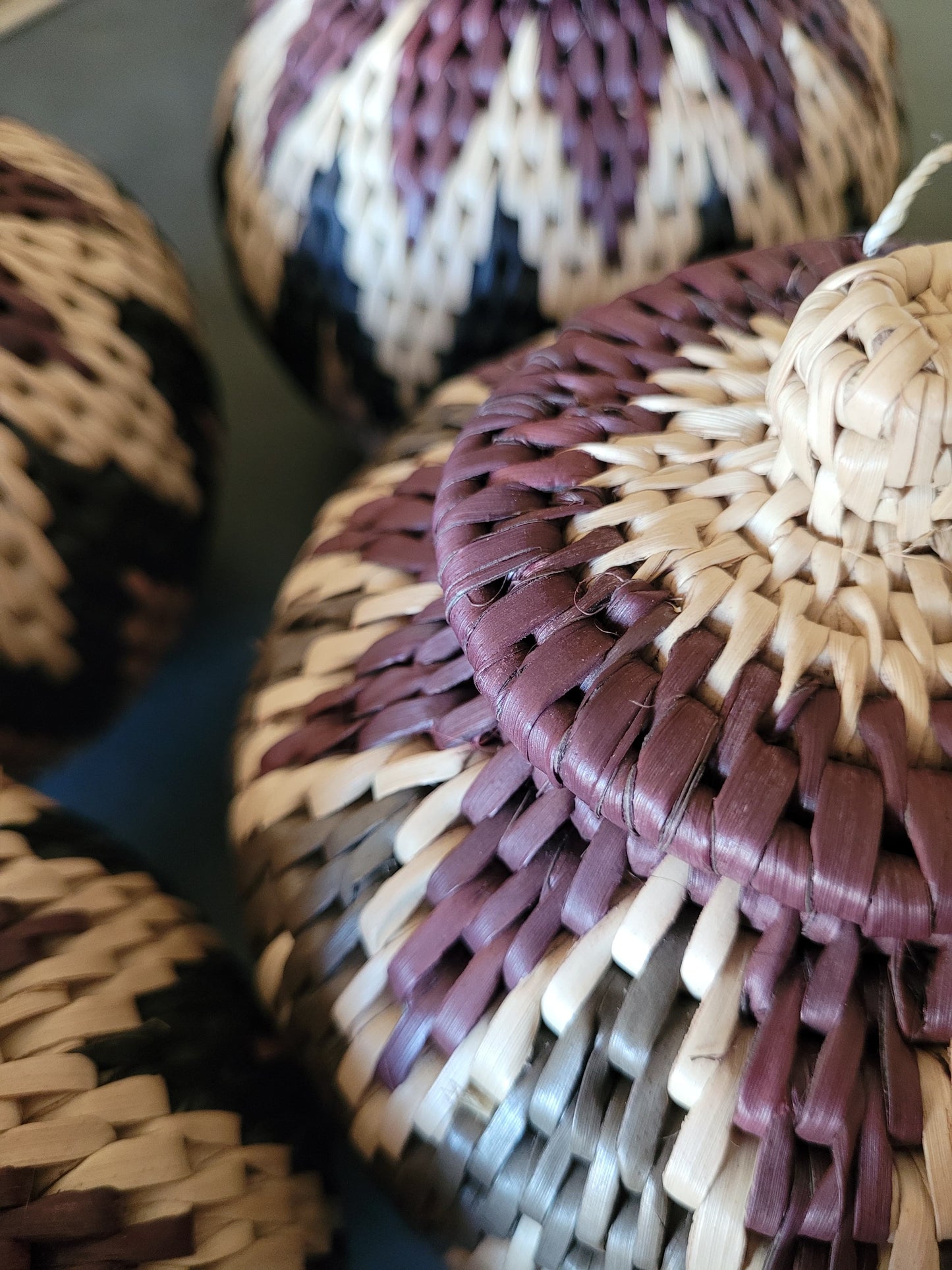 Close-up of African woven baskets with a focus on texture and pattern.