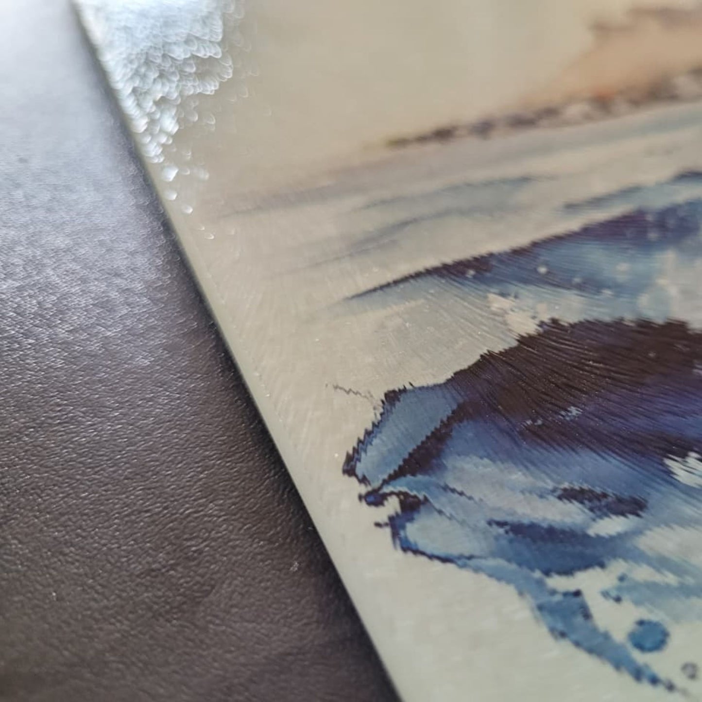 Close-up of a textured surface with blue and white patterns