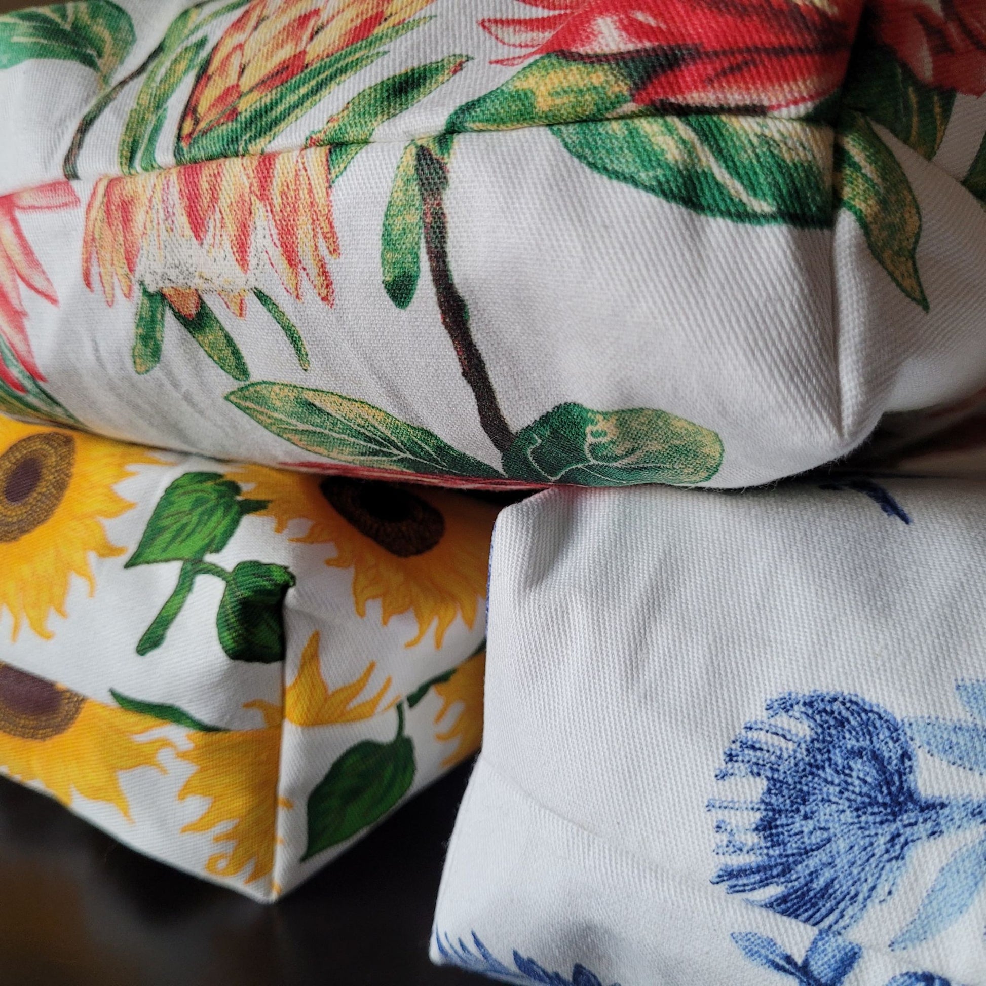 Close-up of floral-patterned fabric with sunflower design