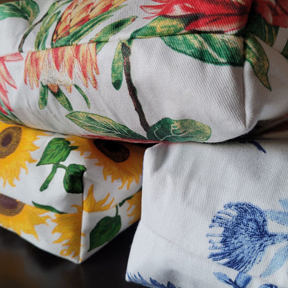 Close-up of floral-patterned fabric with sunflower design