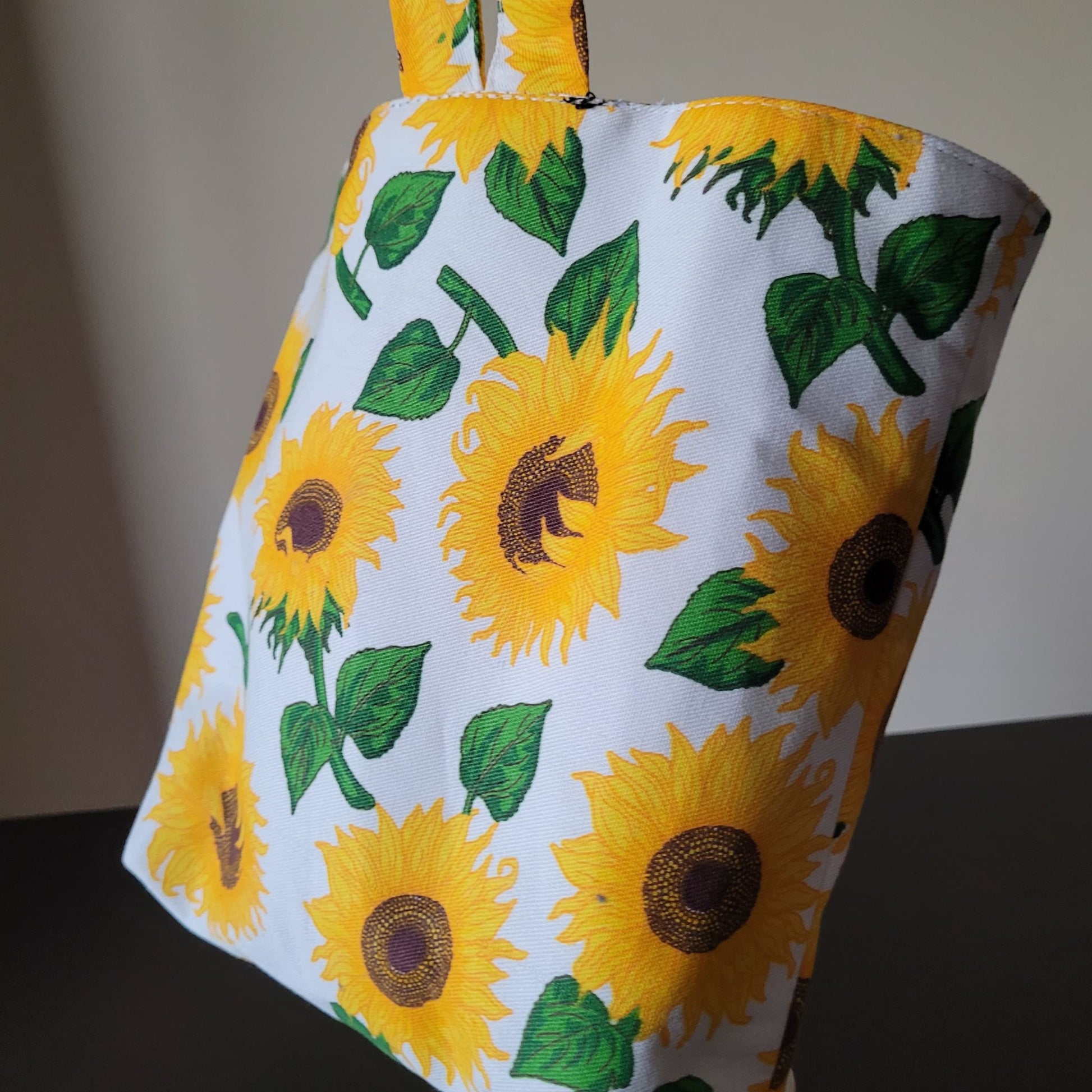 Fabric with sunflower pattern on a white background