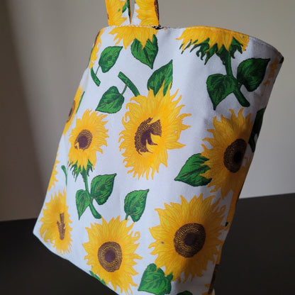 Fabric with sunflower pattern on a white background